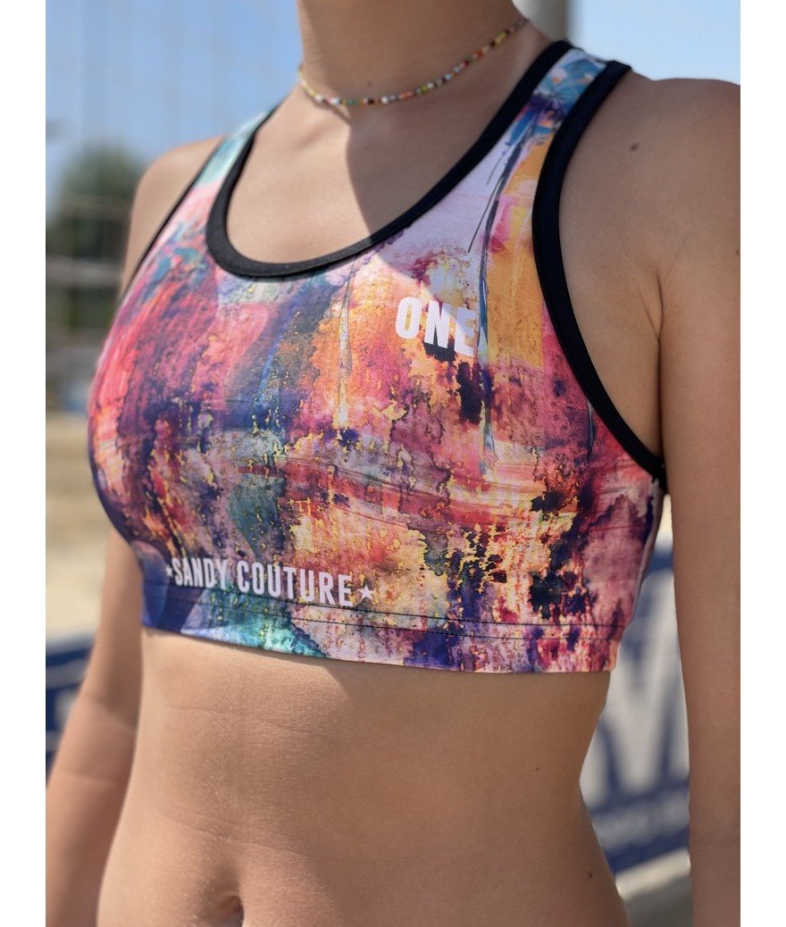Confezionato in Italia, il top è il prodotto ideale per praticare attività sportiva abbracciando lo stile unico "Miami".